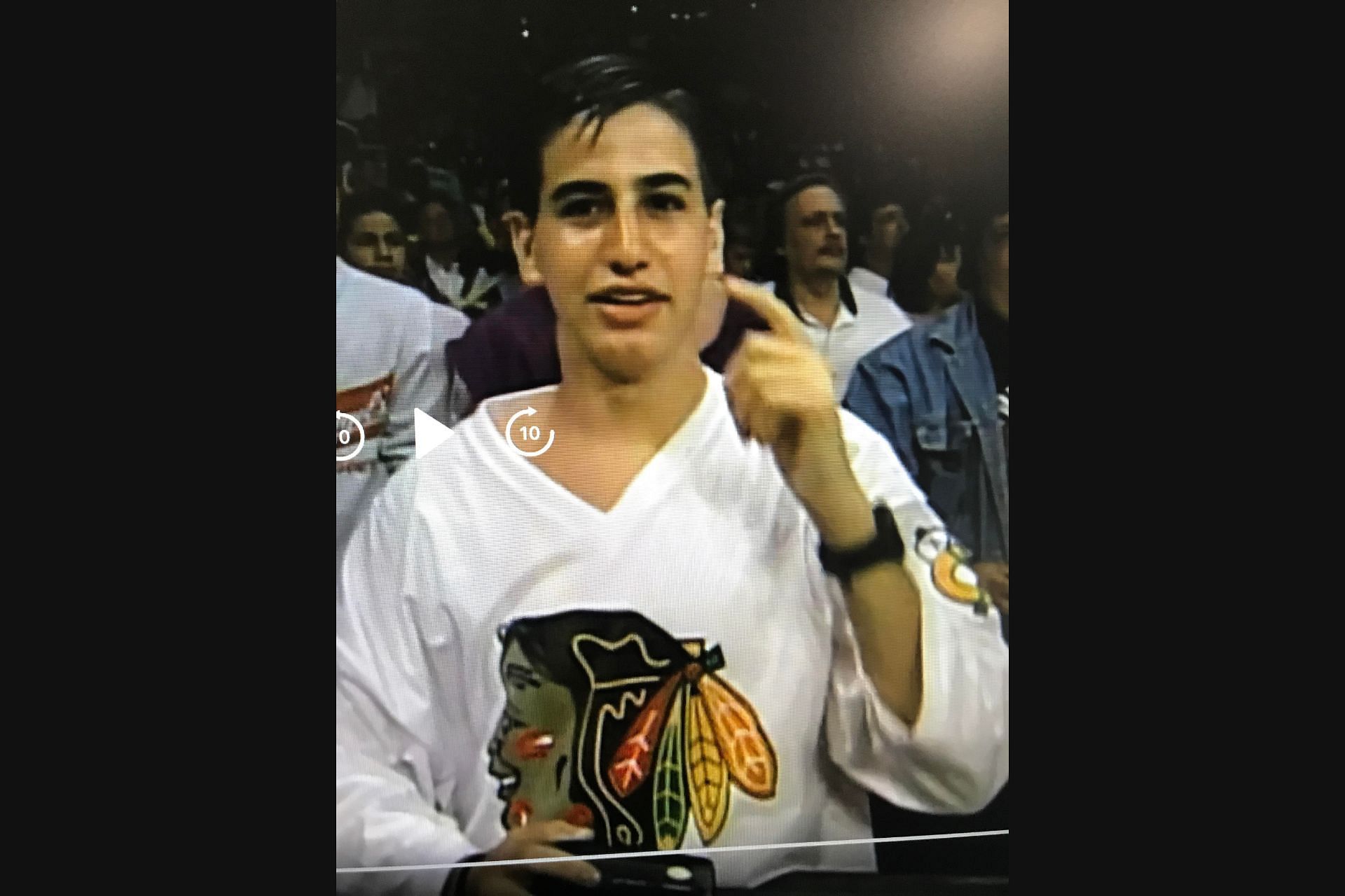 Justin Roberts lighting up a wrestling arena with his smile.