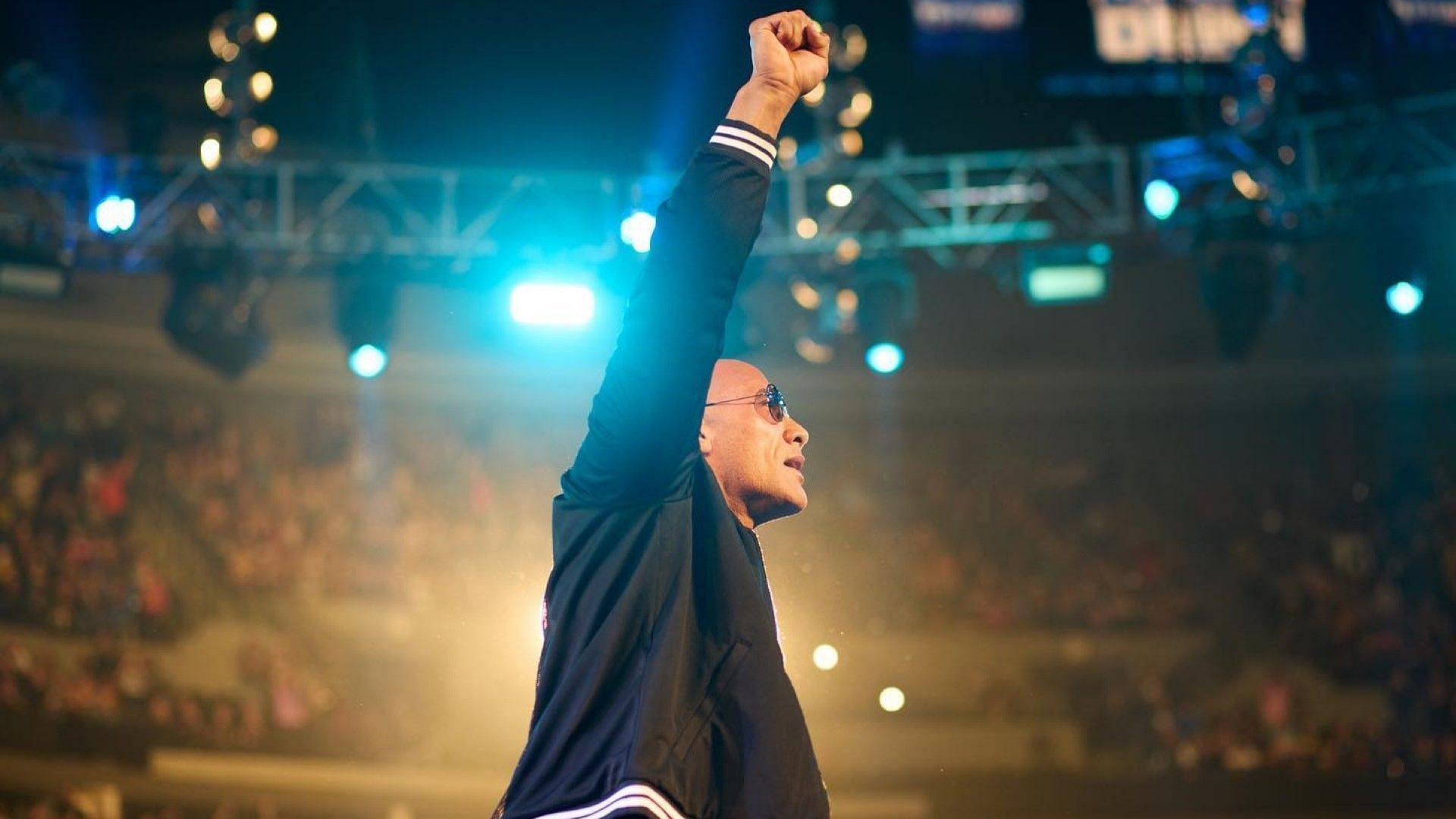 The Rock poses for fans on WWE SmackDown