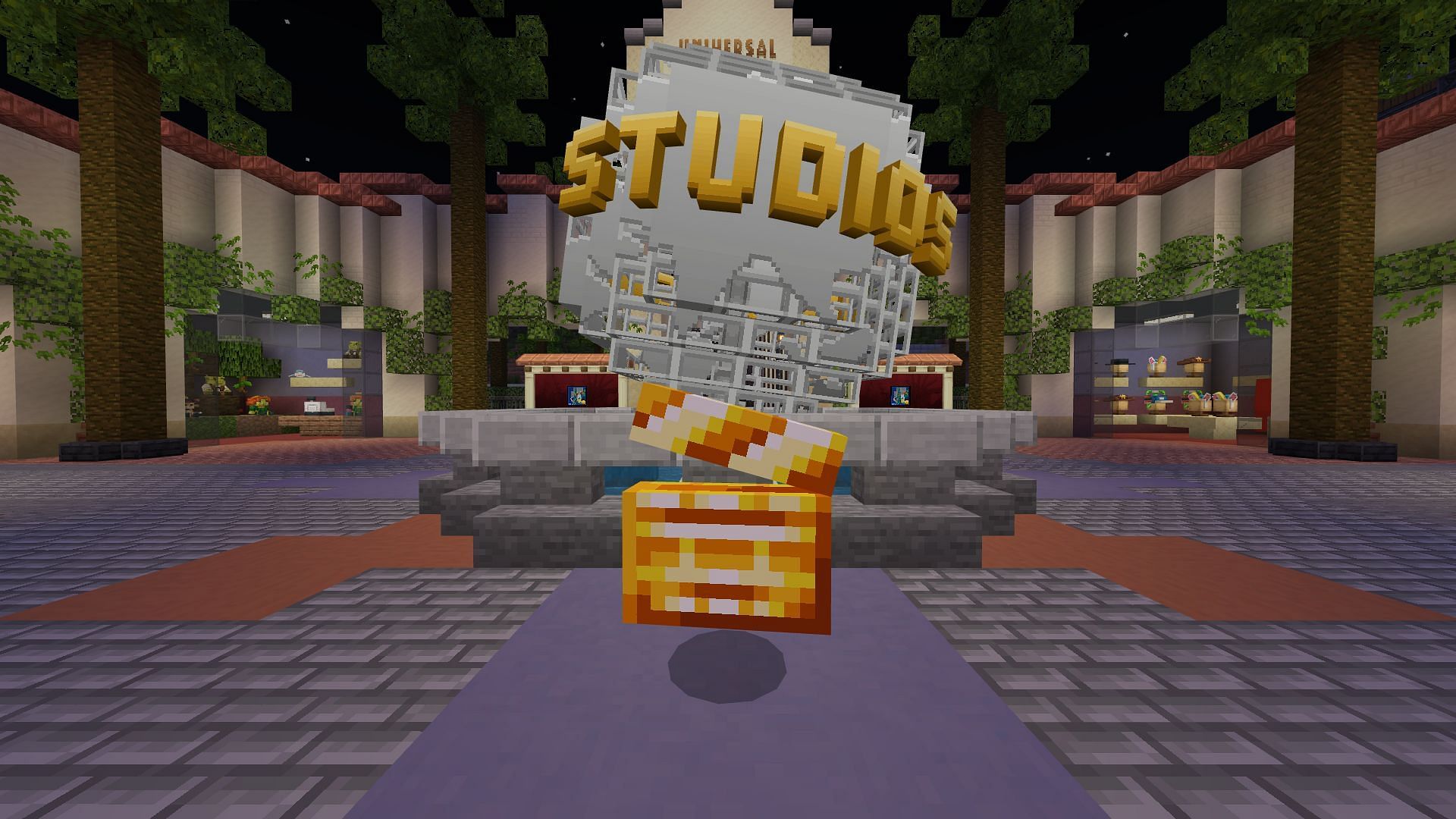 Le premier battant se trouve juste à côté du globe universel, là où le joueur apparaît sur le serveur d'événements Minecraft Universal Studios (Image via Mojang)