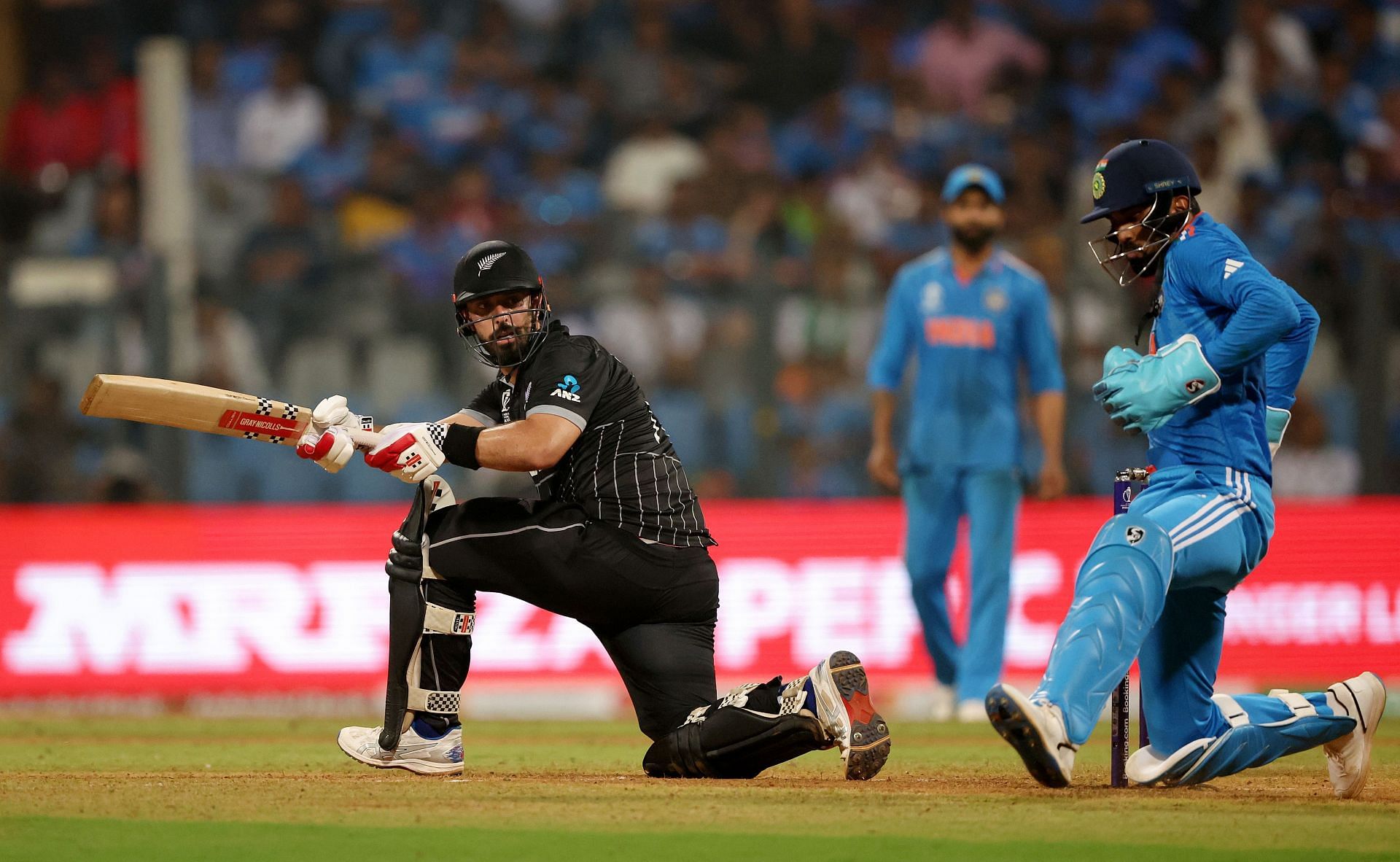 Daryl Mitchell sweeps: India v New Zealand: Semi Final - ICC Men&#039;s Cricket World Cup India 2023