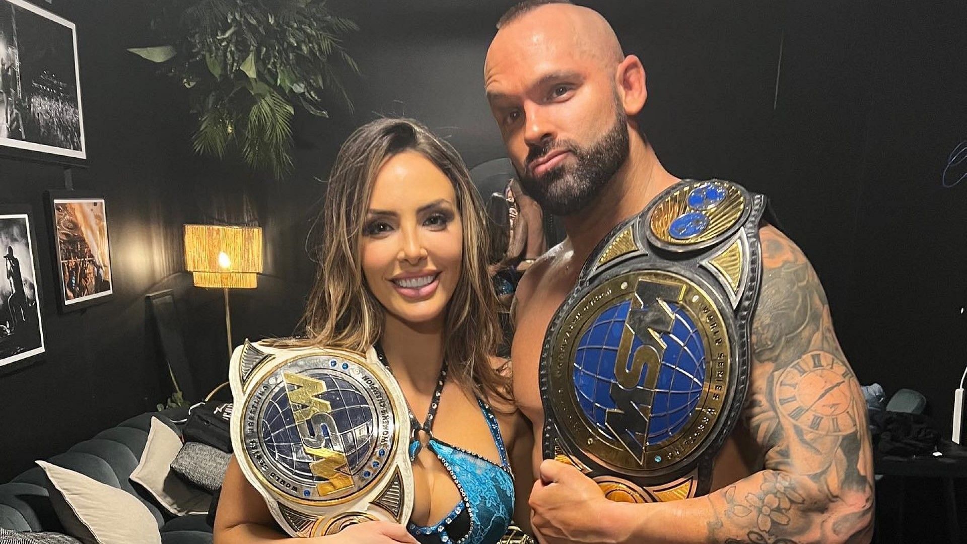 Cassie Lee and Shawn Spears show off their WSW belts