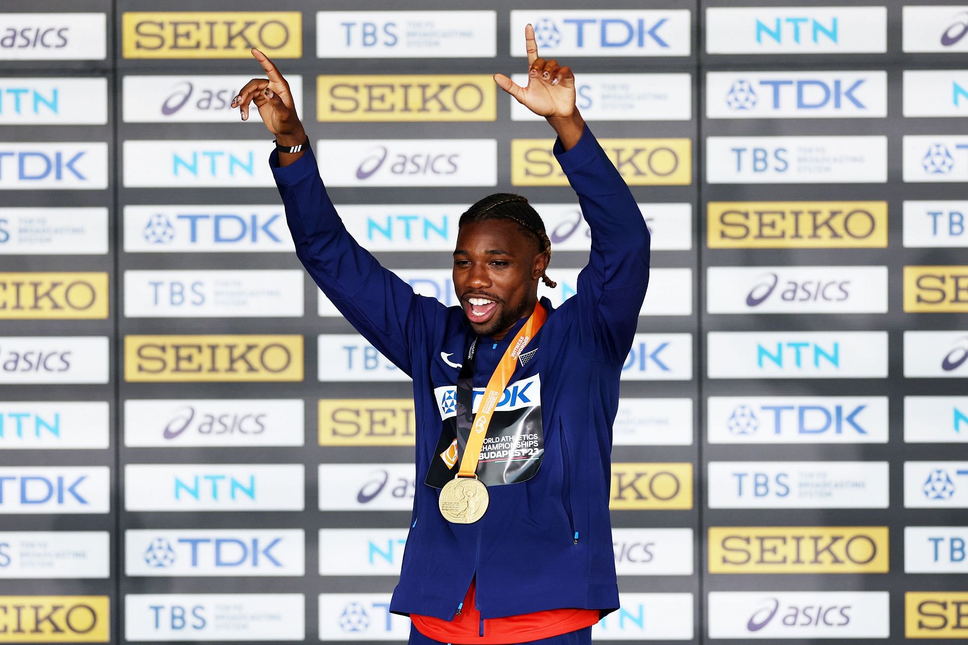 Noah Lyles celebrates with his gold medal on the podium after the Men&#039;s 200m Final during the World Athletics Championships 2023 in Budapest, Hungary.