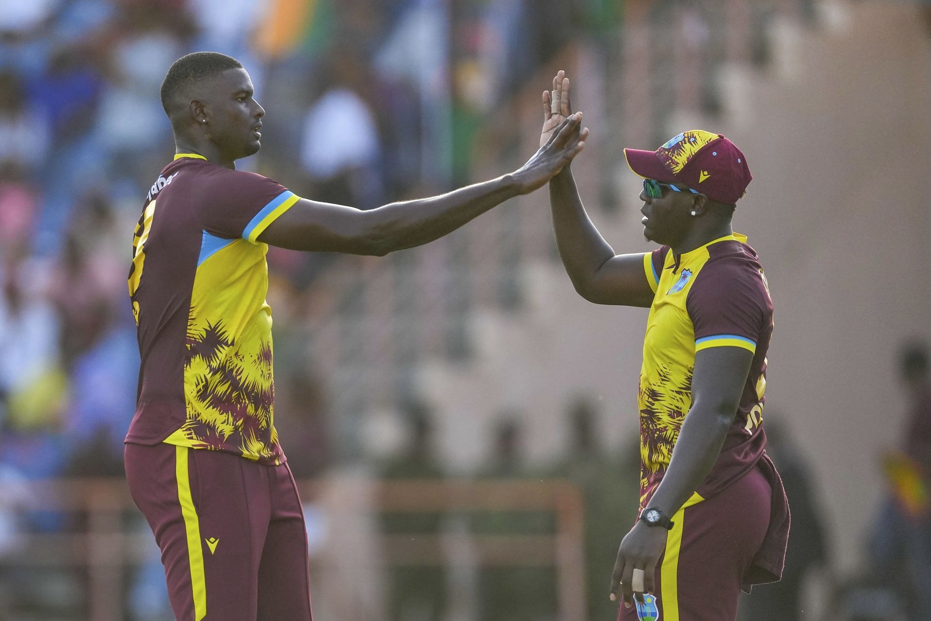 Rovman Powell [right] could ask Jason Holder a thing or two about being part of RR
