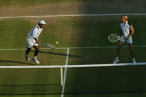 Leander Paes of India and Martina Navratilova of the USA in action in the Mixed Doubles Final during the final day of the Wimbledon Lawn Tennis Championship - Getty Images