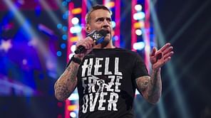Wrestling legend wants CM Punk to bring back former champion for a unique "family vs. family" feud on RAW (Exclusive)