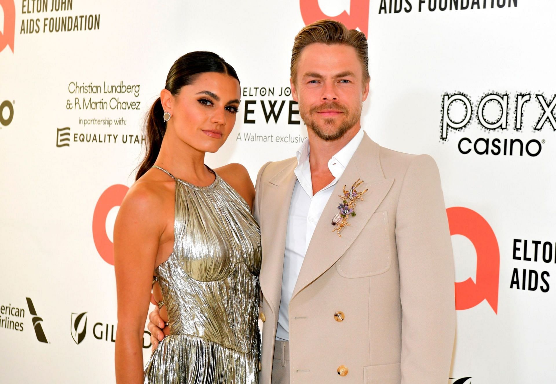 Details revealed as Derek Hough reveals the condition of his wife as she recovers from emergency surgery. (Image via Getty Images)