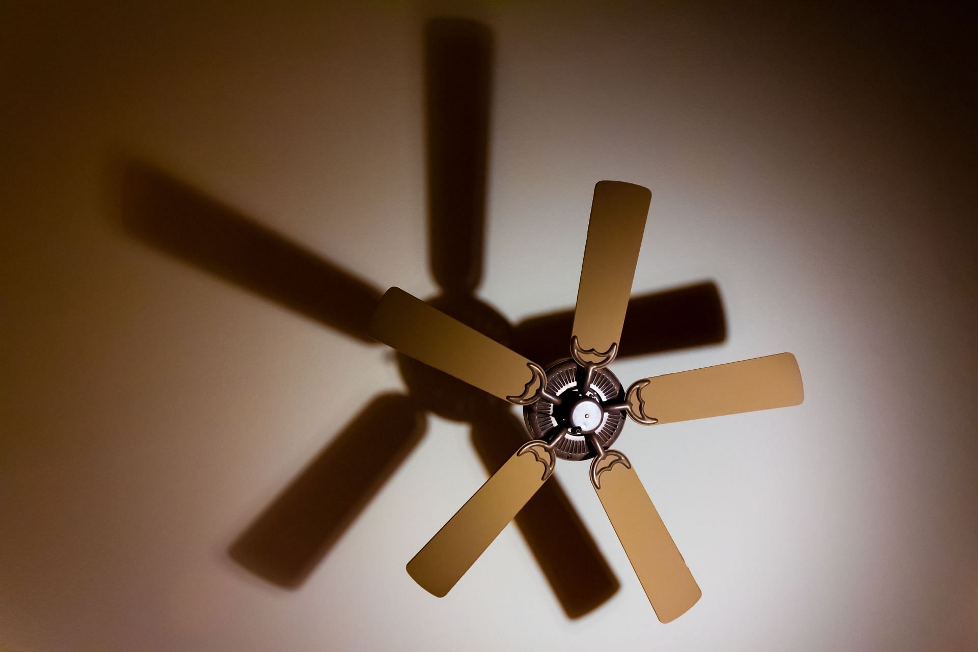 Fans for white noise are effective for deep sleep (Image via Unsplash/ Jason Anderson)