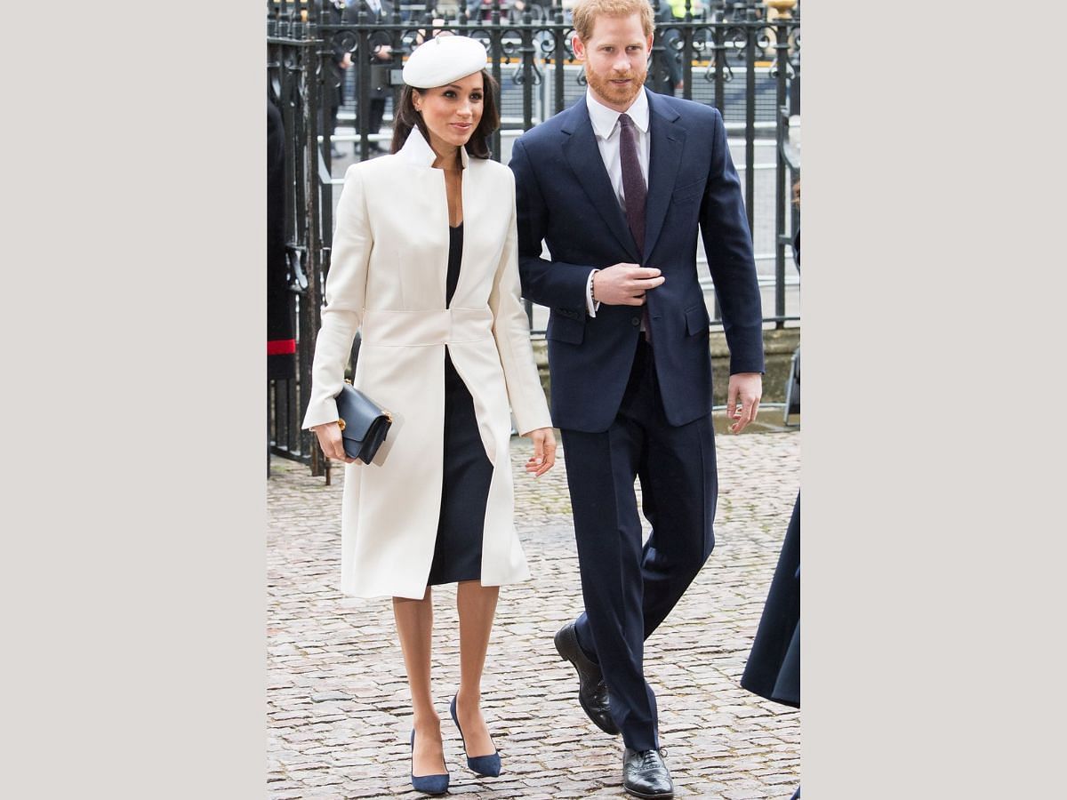 Megan Markle in white Layering ( Image via Hollywood Life)