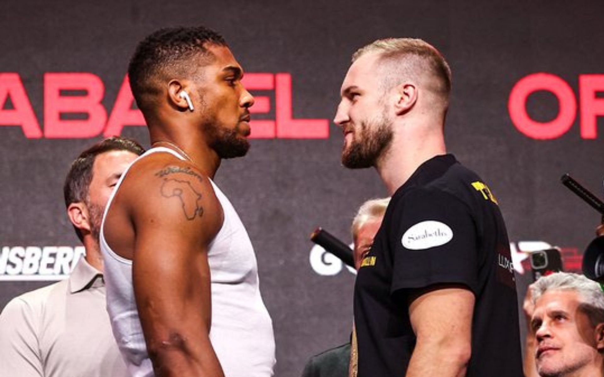 Anthony Joshua (left) and Otto Wallin (right) at the final face-off (Images courtesy @Queensberry on X)