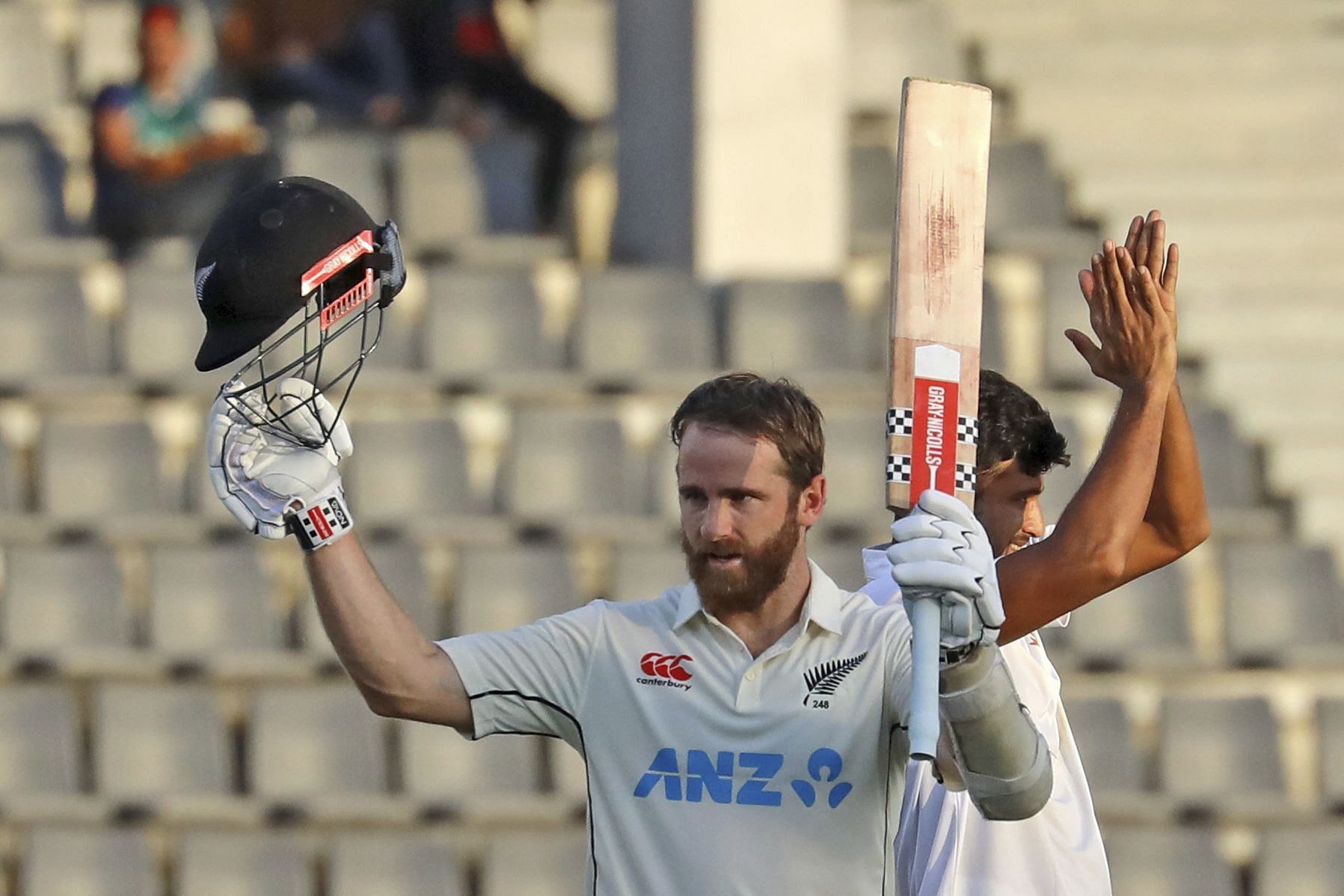 Kane Williamson raising his bat after a century vs BAN [Getty Images]