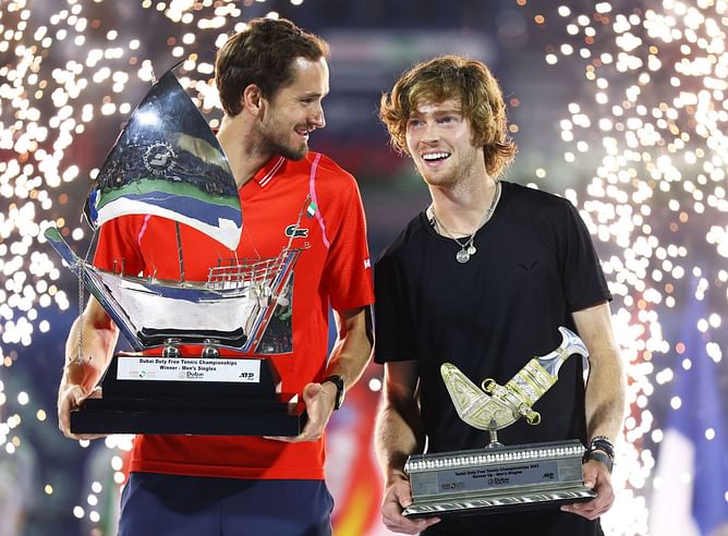 Daniil Medvedev tries to scare Andrey Rublev by looking to hit tennis ball straight at him as duo goof around during practice at World Tennis League