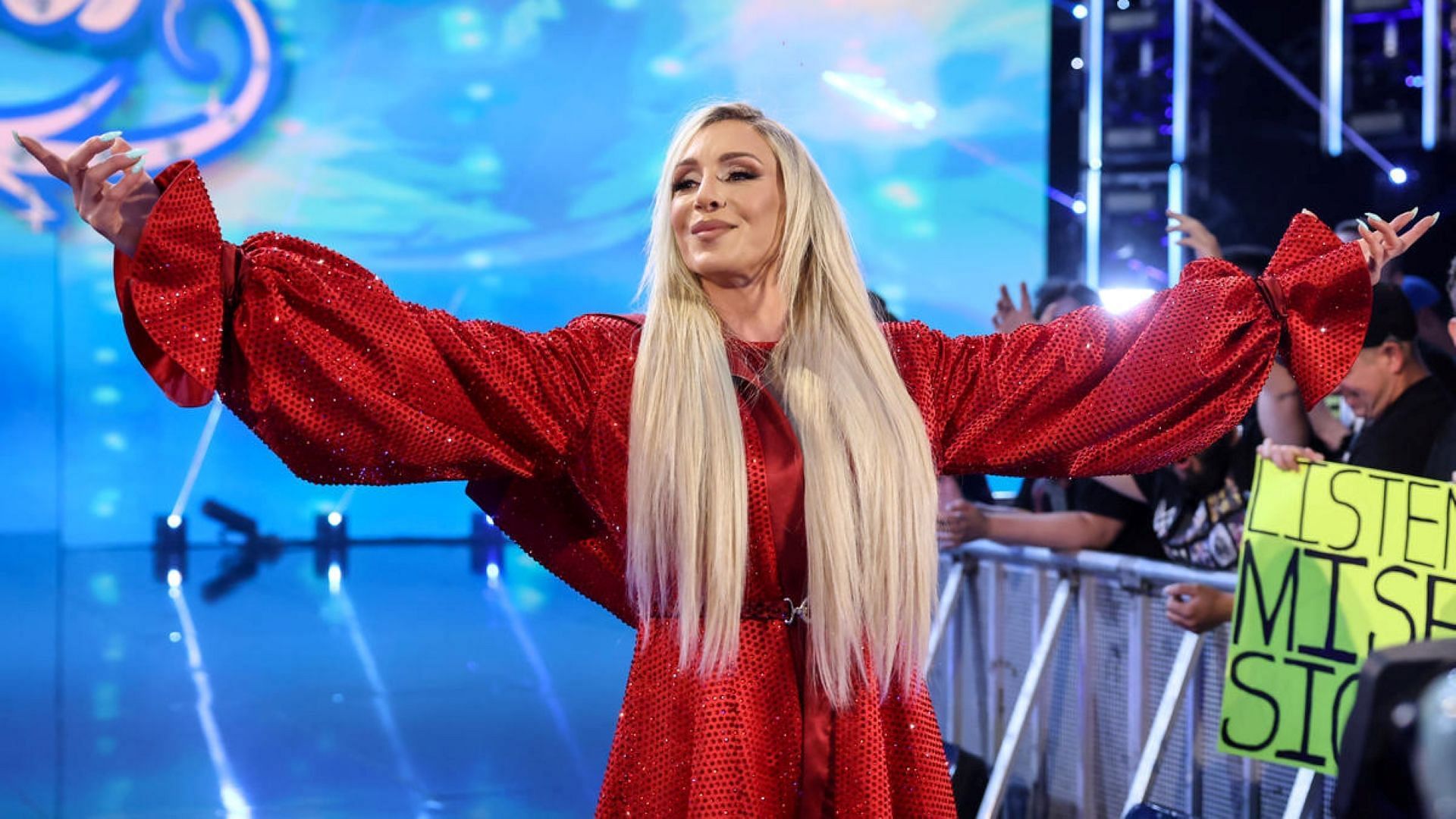 Charlotte Flair poses for fans on WWE SmackDown