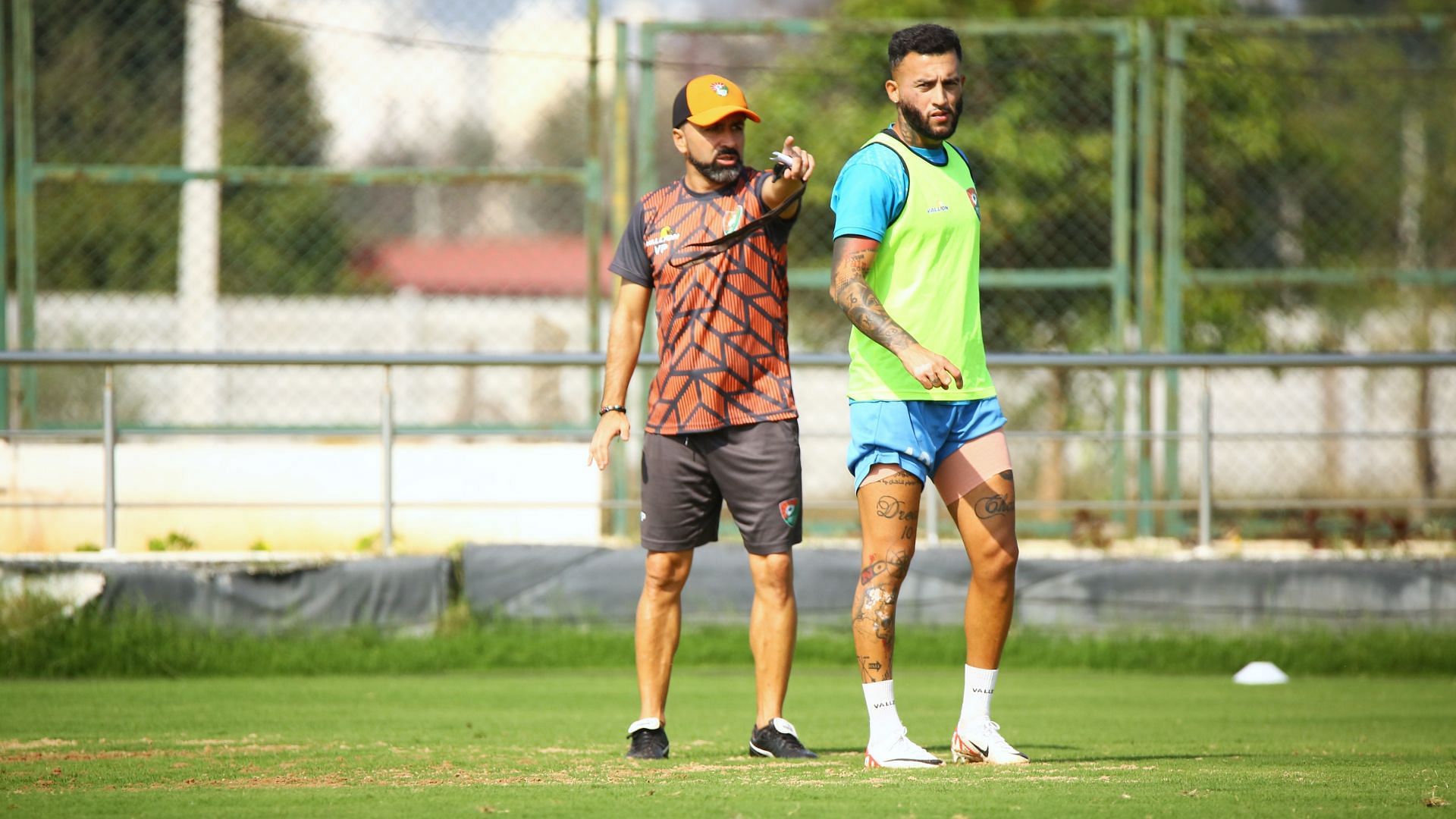 Sreenidi Deccan Head Coach Carlos Vaz Pinto and midfielder Faysal Shayesteh during training.
