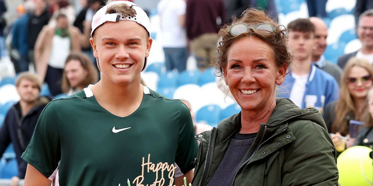 Holger Rune with his mother Aneke (R)