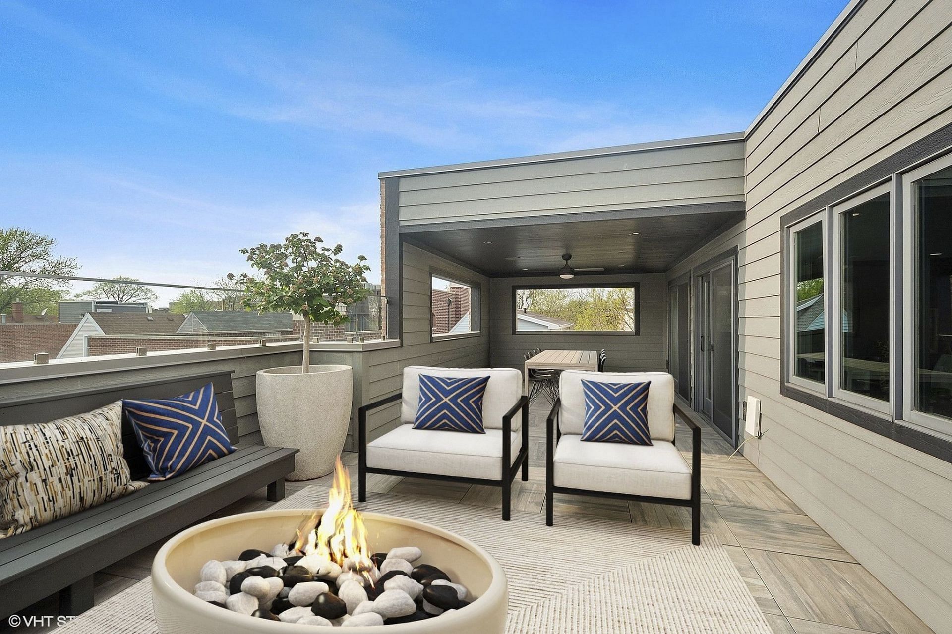 Porch view and fireplace on the deck of the mansion