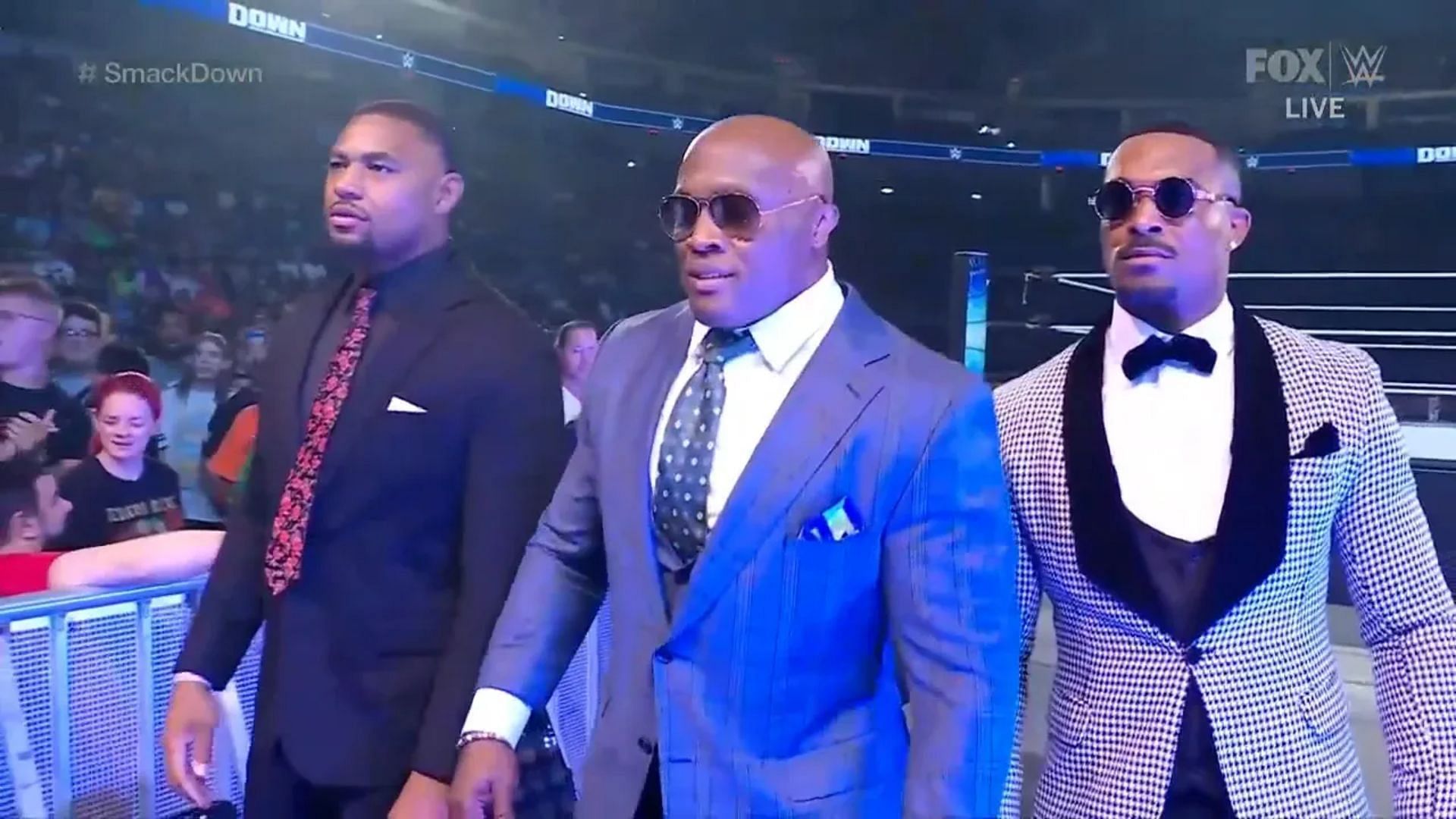 From left to right: Angelo Dawkins, Bobby Lashley and Montez Ford