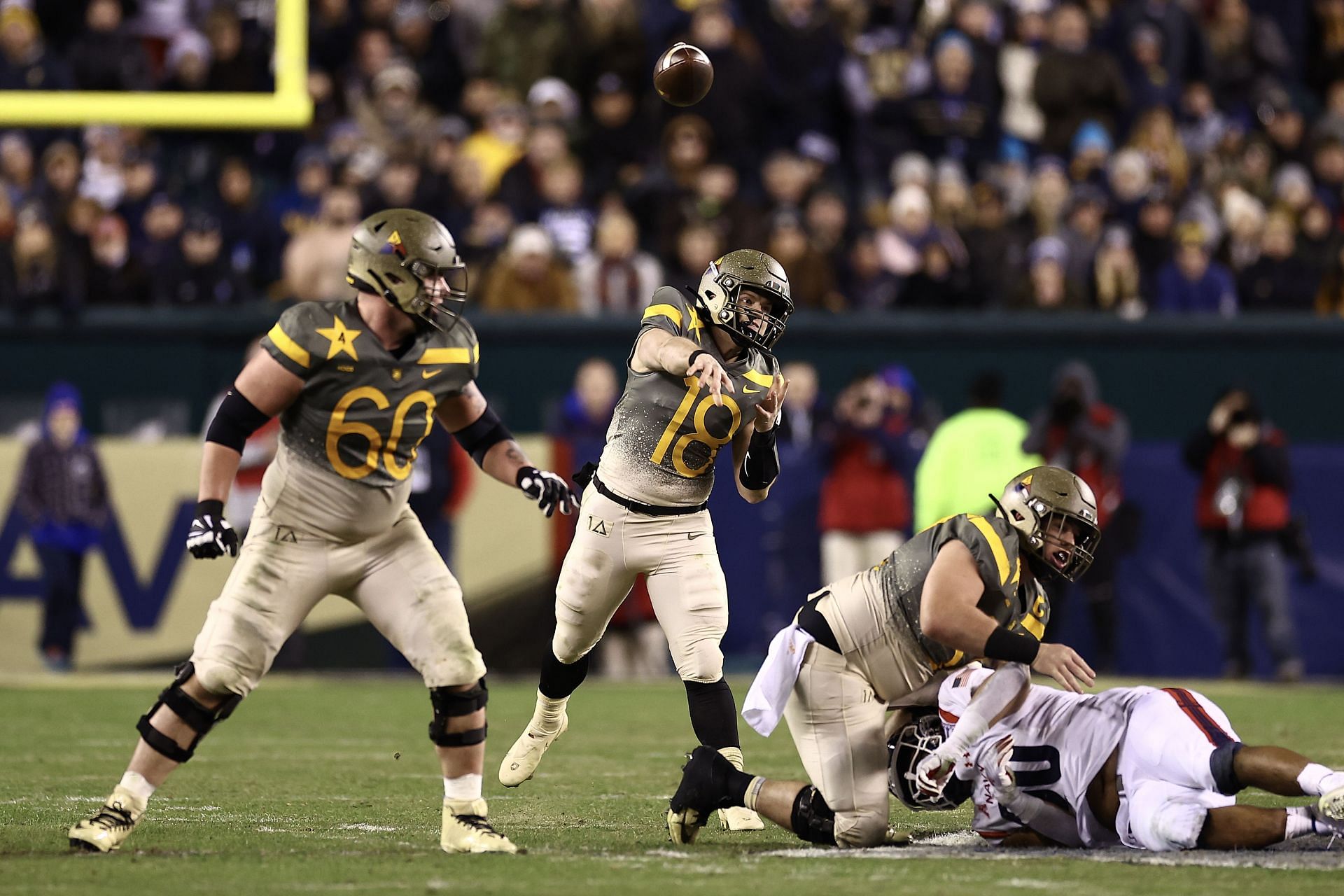 Army v Navy: PHILADELPHIA, PENNSYLVANIA - DECEMBER 10: Cade Ballard #18 of the Army Black Knights throws during the fourth quarter against the Navy Midshipmen at Lincoln Financial Field on December 10, 2022 in Philadelphia, Pennsylvania. (Photo by Tim Nwachukwu/Getty Images)