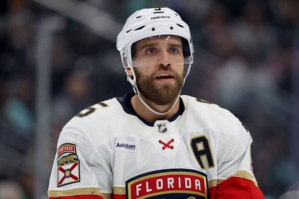 Aaron Ekblad of the Florida Panthers looks on during the first period against the Seattle Kraken at Climate Pledge Arena on December 12, 2023 in...