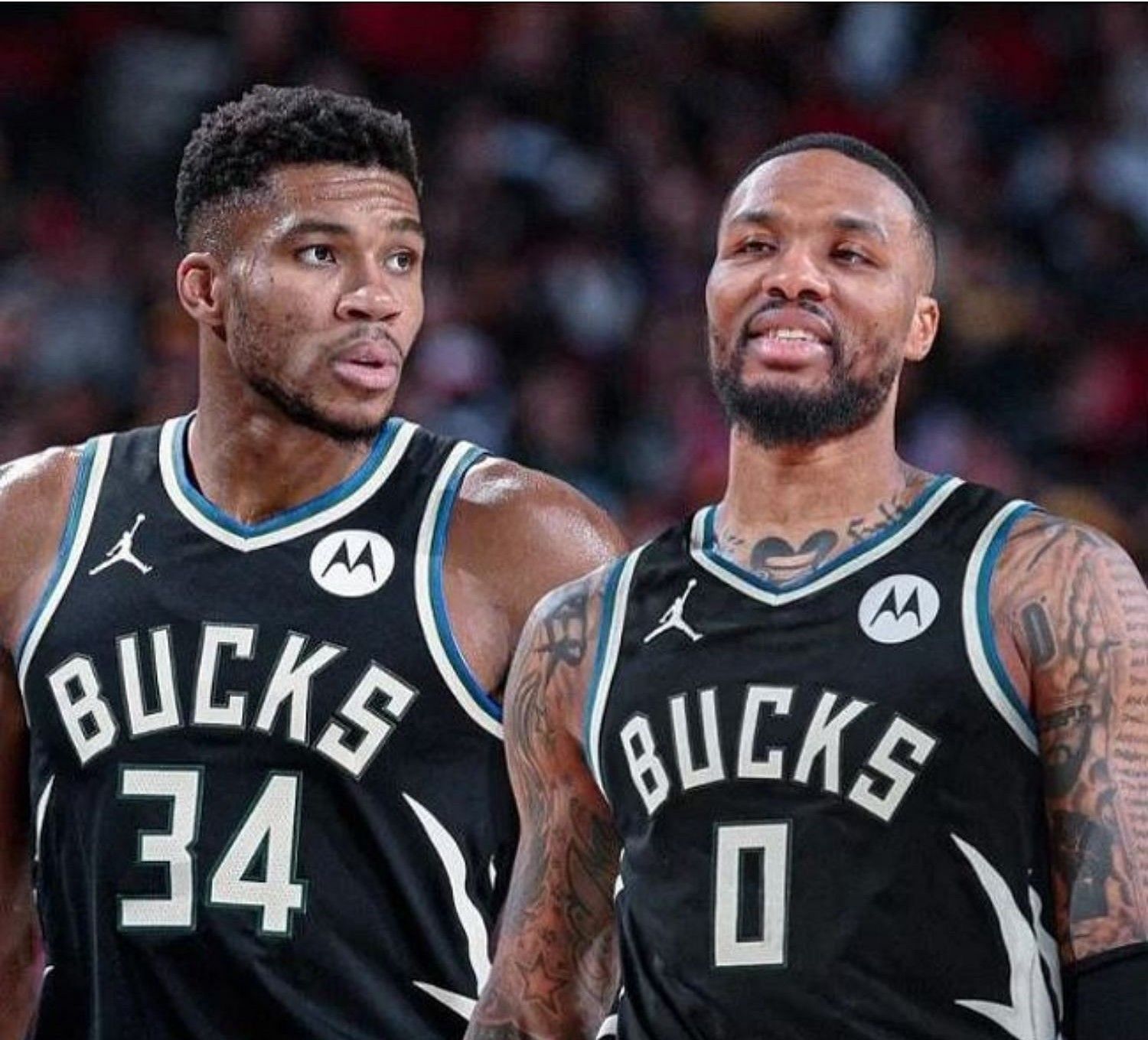 Giannis Antetokounmpo (L) and Damian Lillard (R) provided separate highlight-reel moments in their victory over the Atlanta Hawks on Saturday. 
