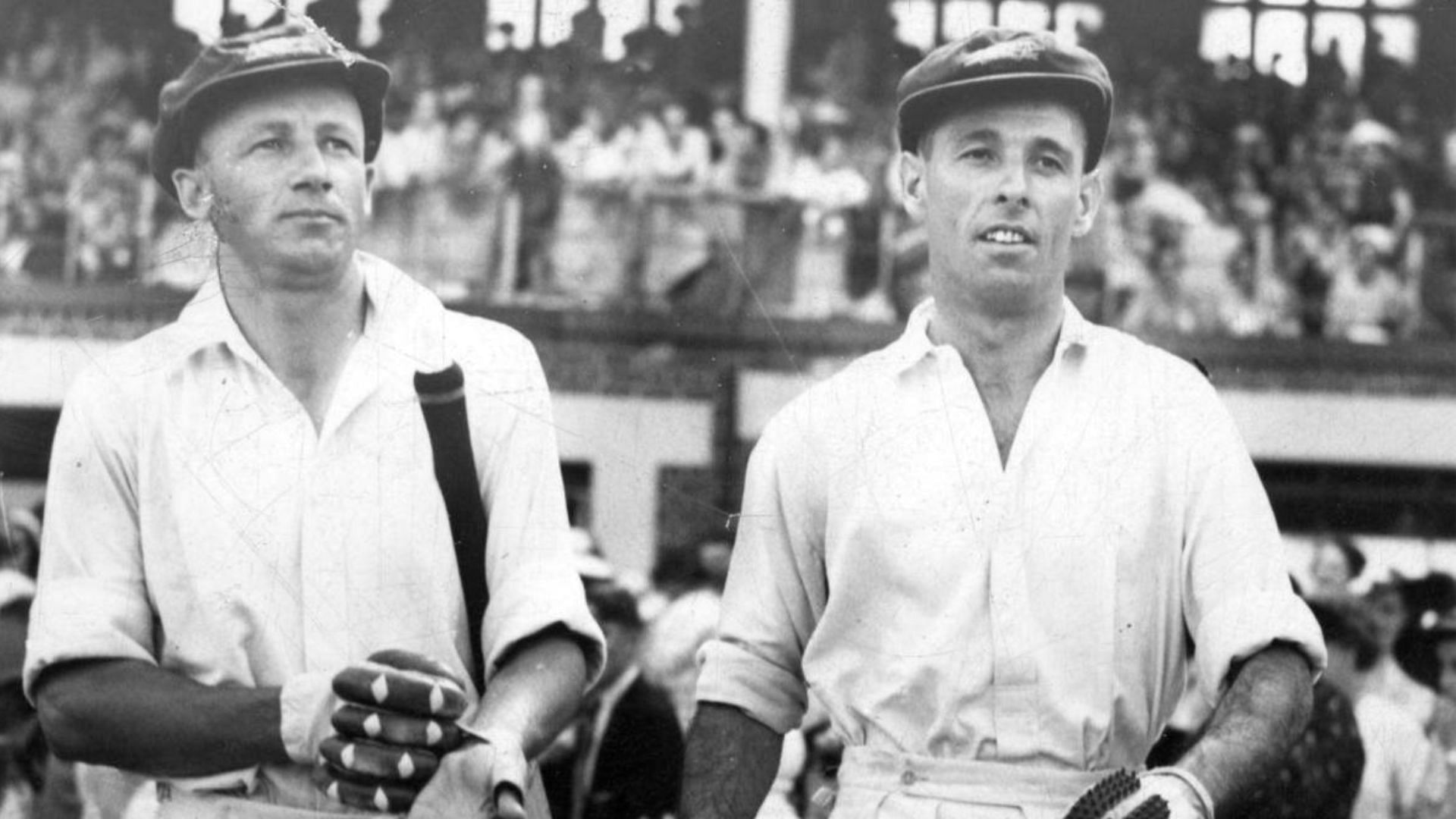 Bradman and Fingleton walking out to bat in a Test match.