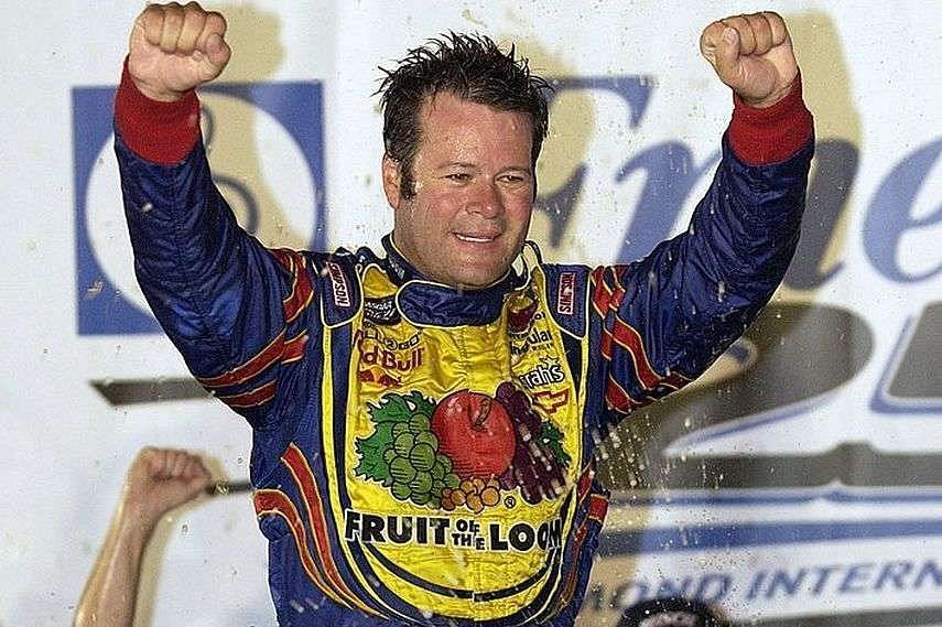 Robby Gordon celebrates his first and only Xfinity Series win at Richmond in 2004 (Image by @RacingPast from X) 