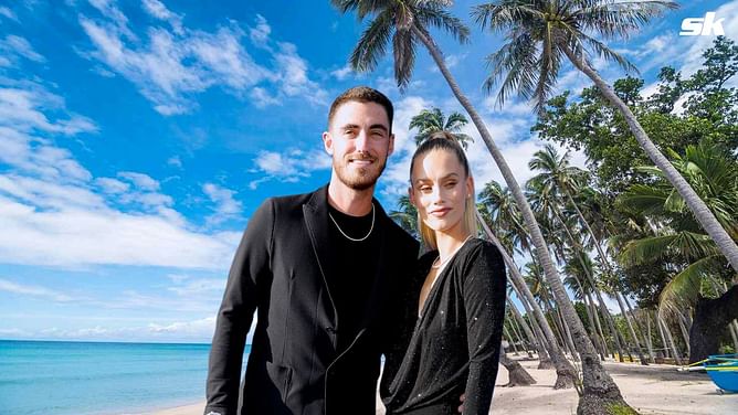 Fans overjoyed as Cody Bellinger and fiance Chase Carter wear engagement rings in stunning beach snap: "You two are a perfect couple"
