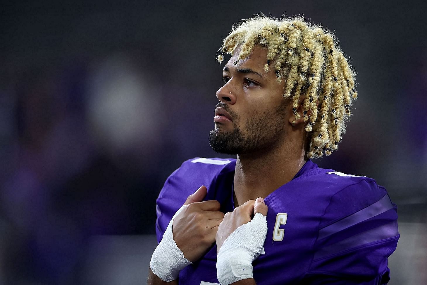 Who are Rome Odunze's parents?