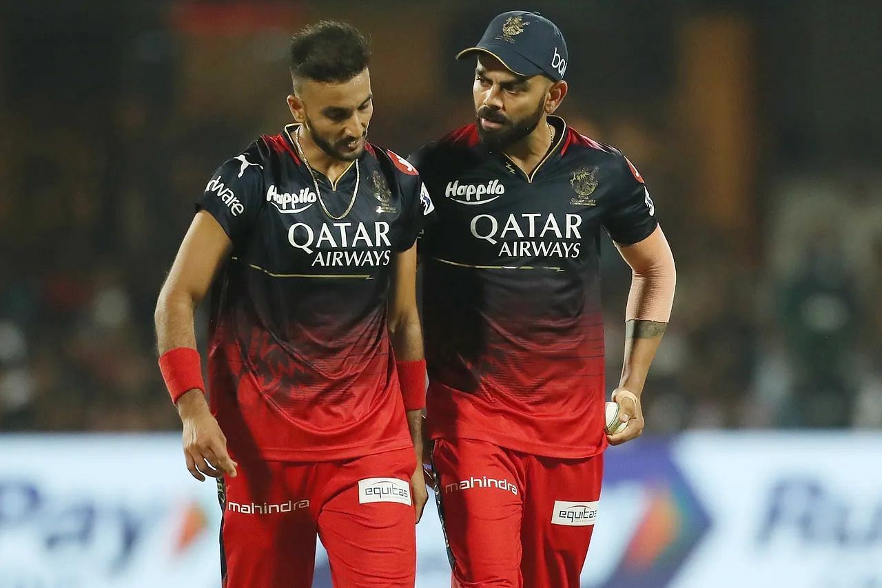 Harshal Patel (left) was one of the bowlers released by RCB ahead of the auction. [P/C: iplt20.com]
