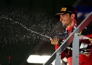 Carlos Sainz celebrating his victory in Singapore earlier in the 2023 season (Photo by Clive Mason/Getty Images)