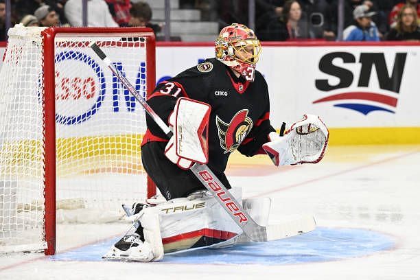 Anton Forsberg of the Ottawa Senators tends the net during the first period against the Pittsburgh Penguins at Canadian Tire Centre on December 23,...