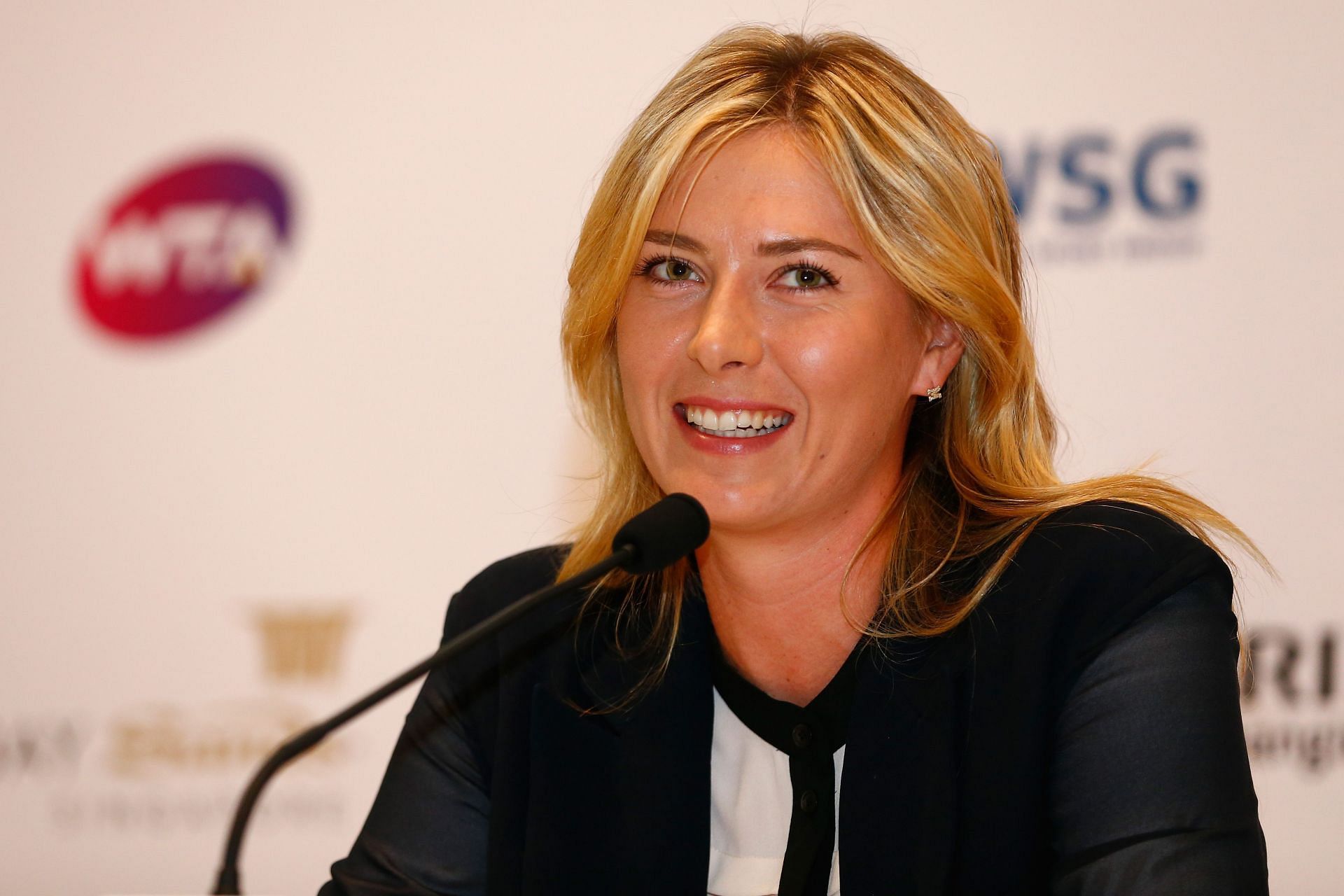 Maria Sharapova talking to the press at the 2014 BNP Paribas WTA Finals