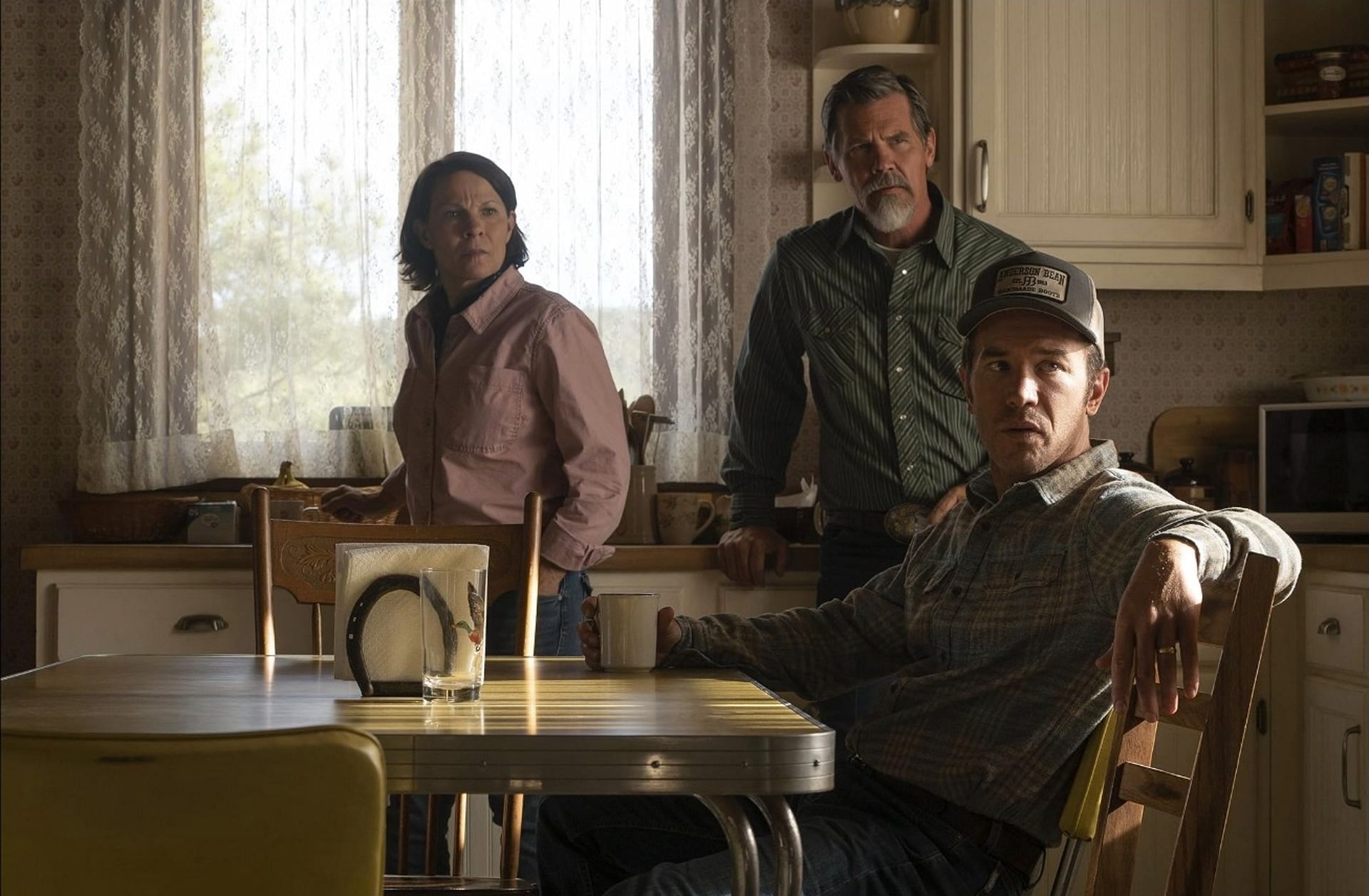 Lili Taylor, Josh Brolin, and Tom Pelphrey in a scene from Outer Range season 1 (Image via IMDb)