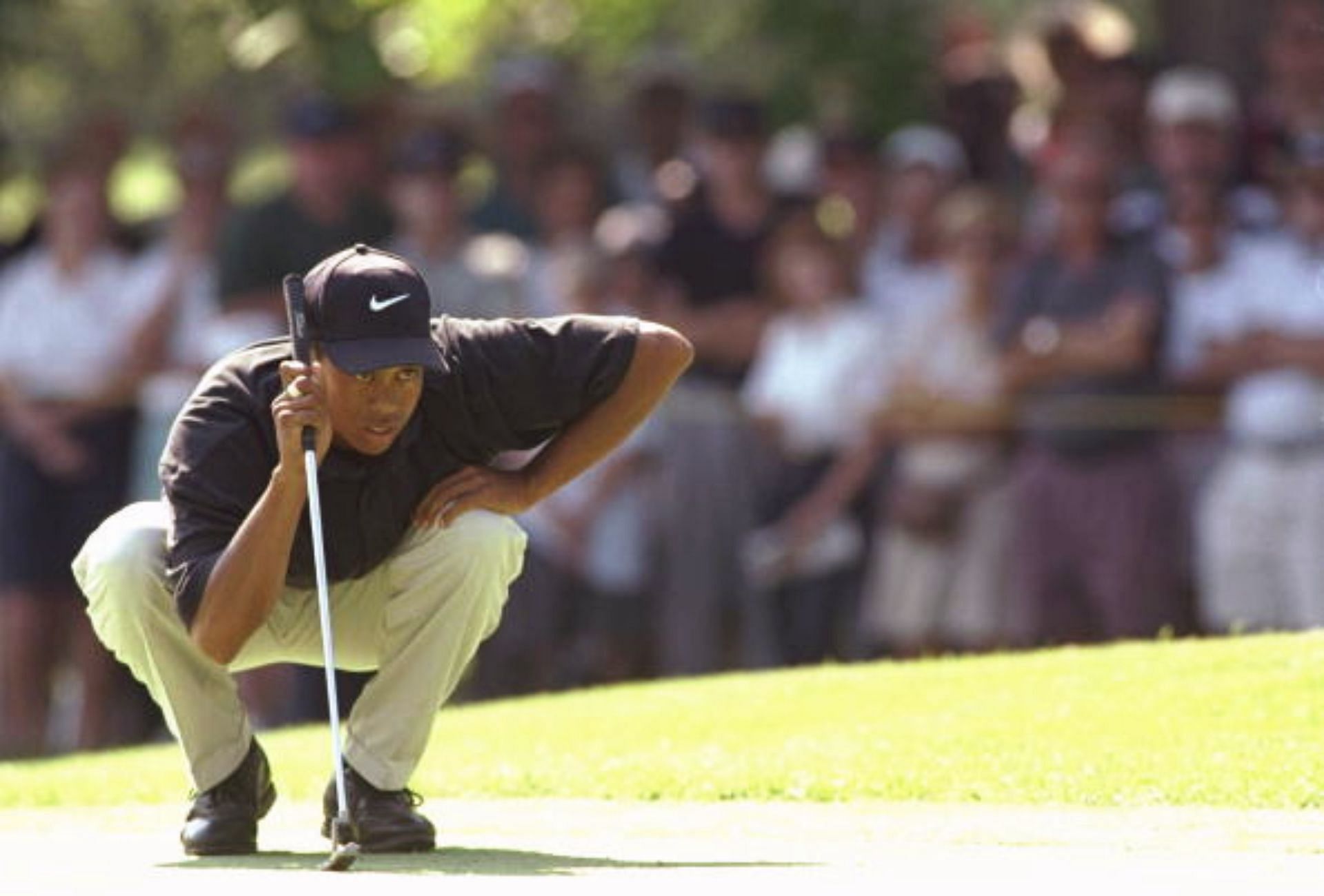 Tiger Woods at his professioanl debut, 1996 Greater Milwakee Open (Image via Getty).