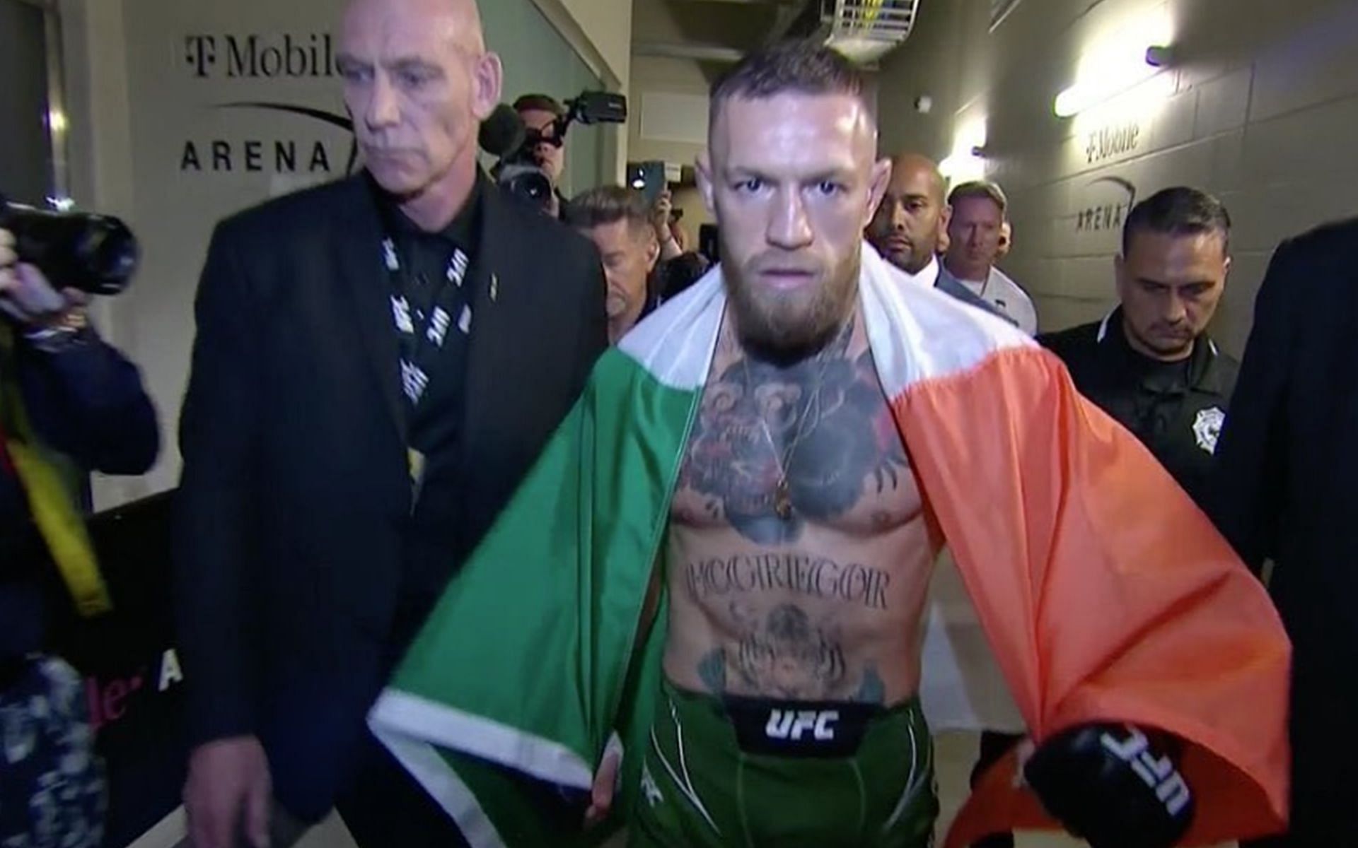 Conor McGregor carrying Irish flag during UFC walkout (Image via @thenotoriousmma Instagram)
