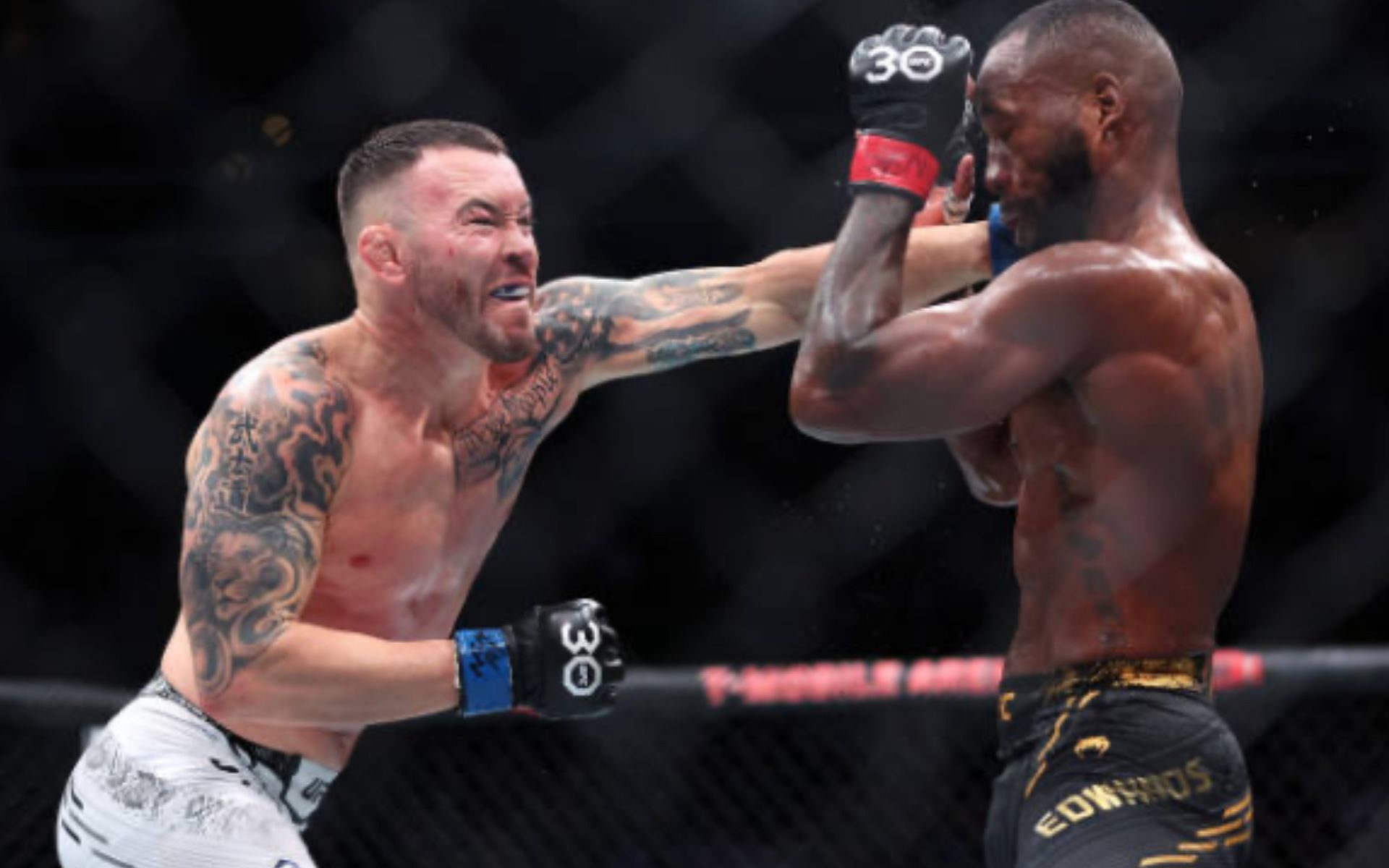 Colby (left) and Leon Edwards (right) at UFC 296 [Photo Courtesy of Getty Images]