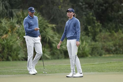 Matt Kuchar and son Cameron at PNC Championship (Image via Getty)