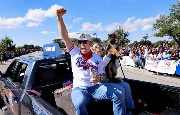 Nathaniel Lowe of the Texas Rangers celebrates with fans during the &lt;span class=&#039;entity-link&#039; id=&#039;suggestBtn-32&#039;&gt;World Series&lt;/span&gt; Victory Parade outside Globe Life Field on November 3, 2023 in...