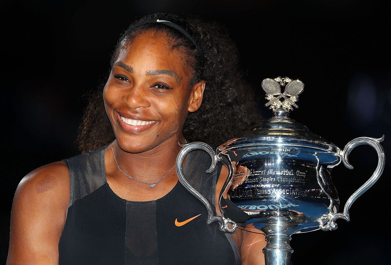 Serena Williams poses with the 2017 Australian Open trophy