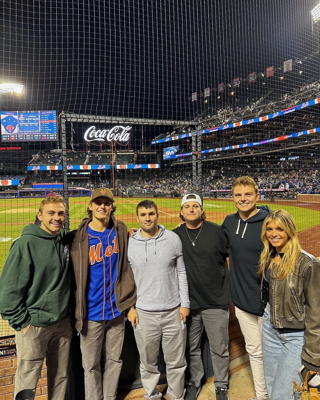 Nicolette Dellanno and Wilson (far right) at a Mets game. Credit: Shad Hathaway (IG)