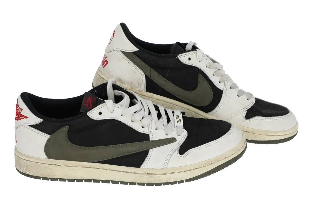 Fans can place bids for the Travis Scott x Nike Air Jordan 1 Low OG &ldquo;Olive&rdquo; sneaker auction (Image via Sneaker News)