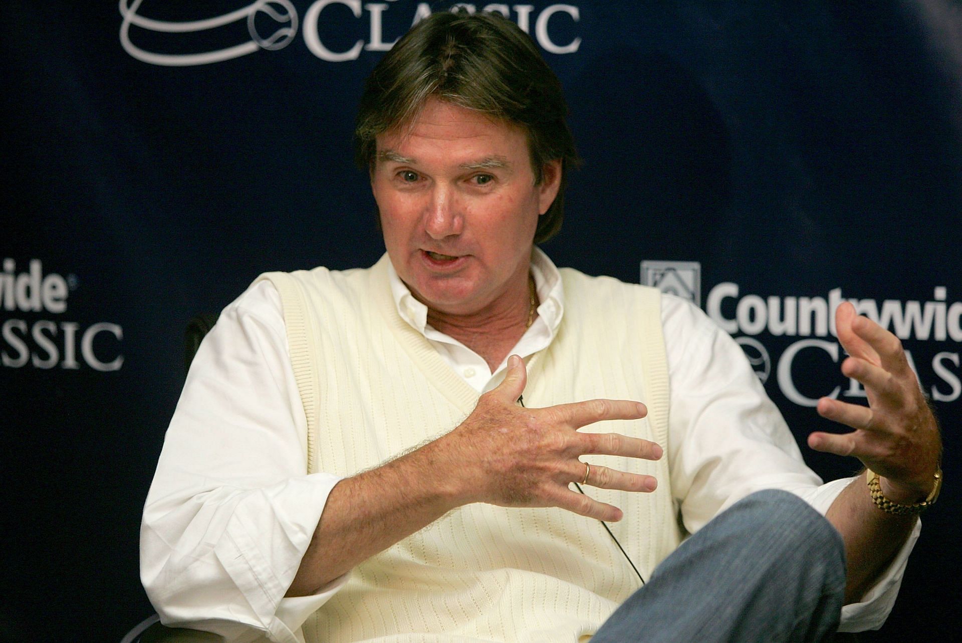 Jimmy Connors speaks at an event