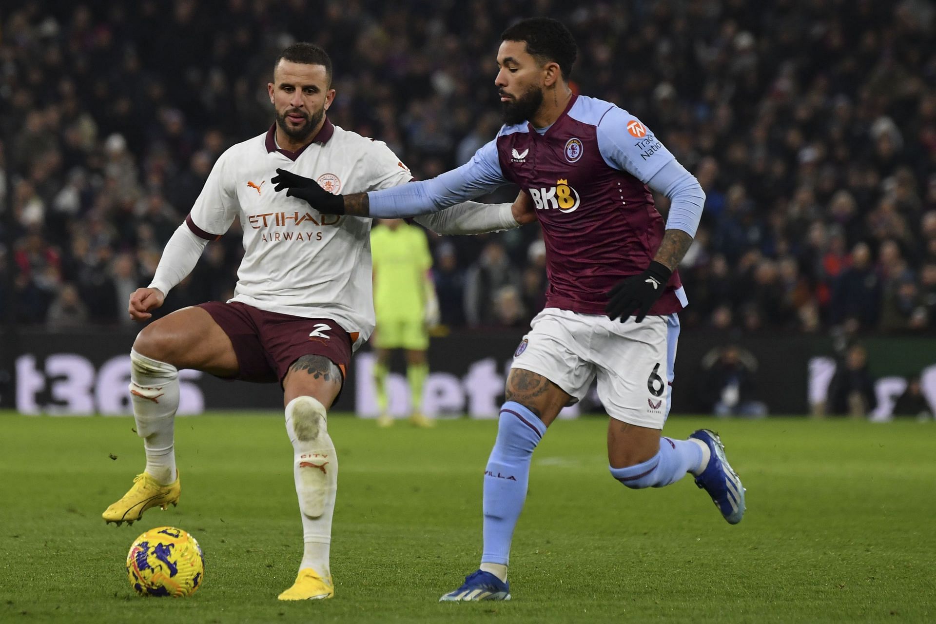 Douglas Luiz (right) has admirers at the Emirates.