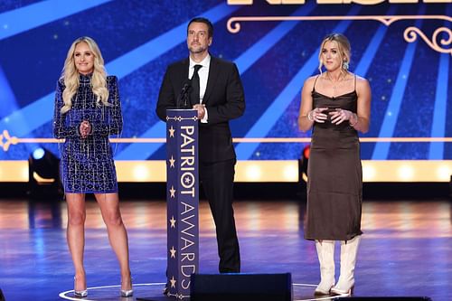 Tomi Lahren, Clay Travis, and Riley Gaines speak onstage during the 2023 FOX Nation Patriot Awards