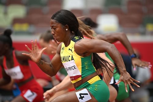 Shelly-Ann Fraser-Pryce of Team Jamaica competes during round one of the Women's 100m heats at the 2020 Olympic Games in Tokyo, Japan.