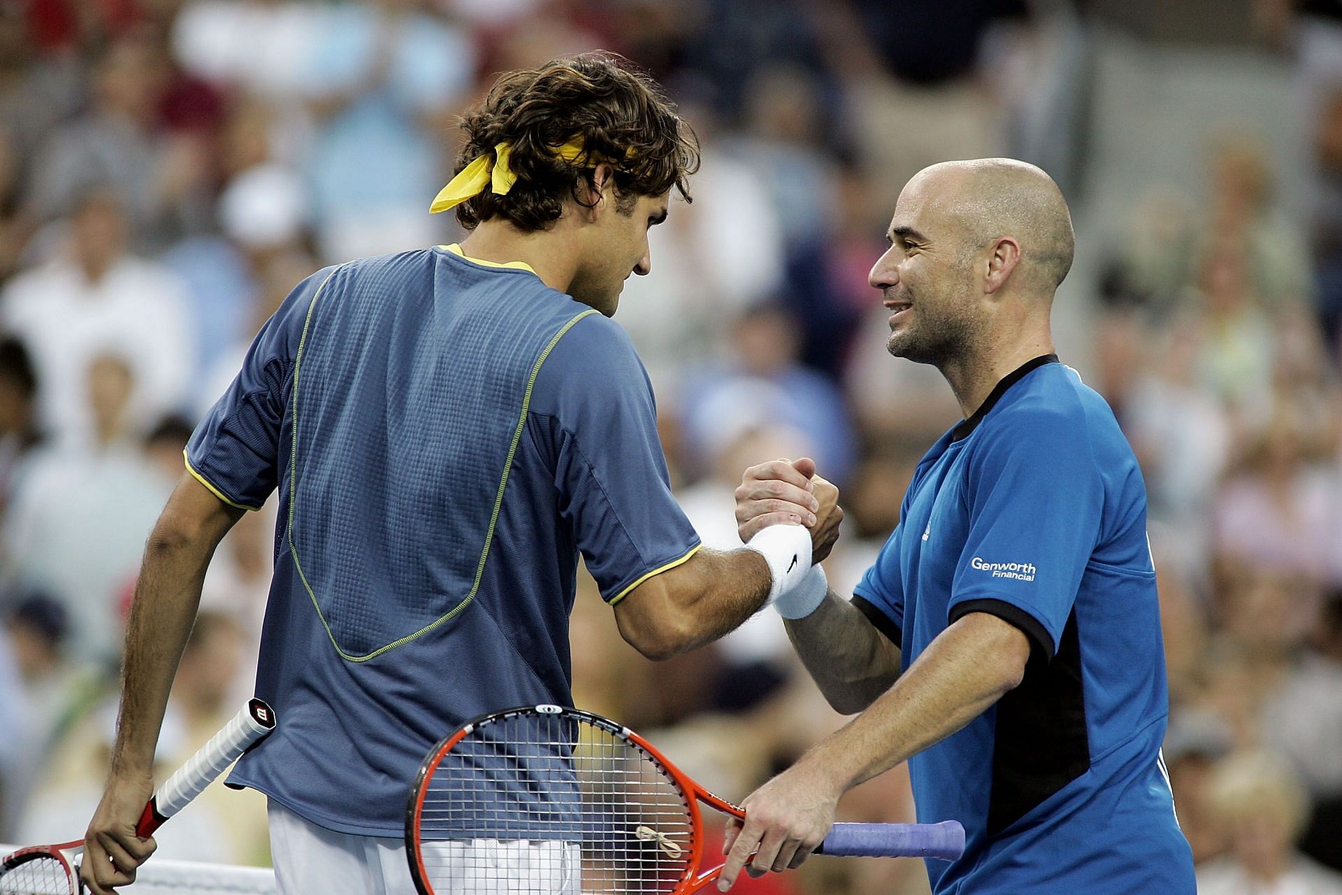 Roger Federer and Andre Agassi pictured at the 2005 US Open