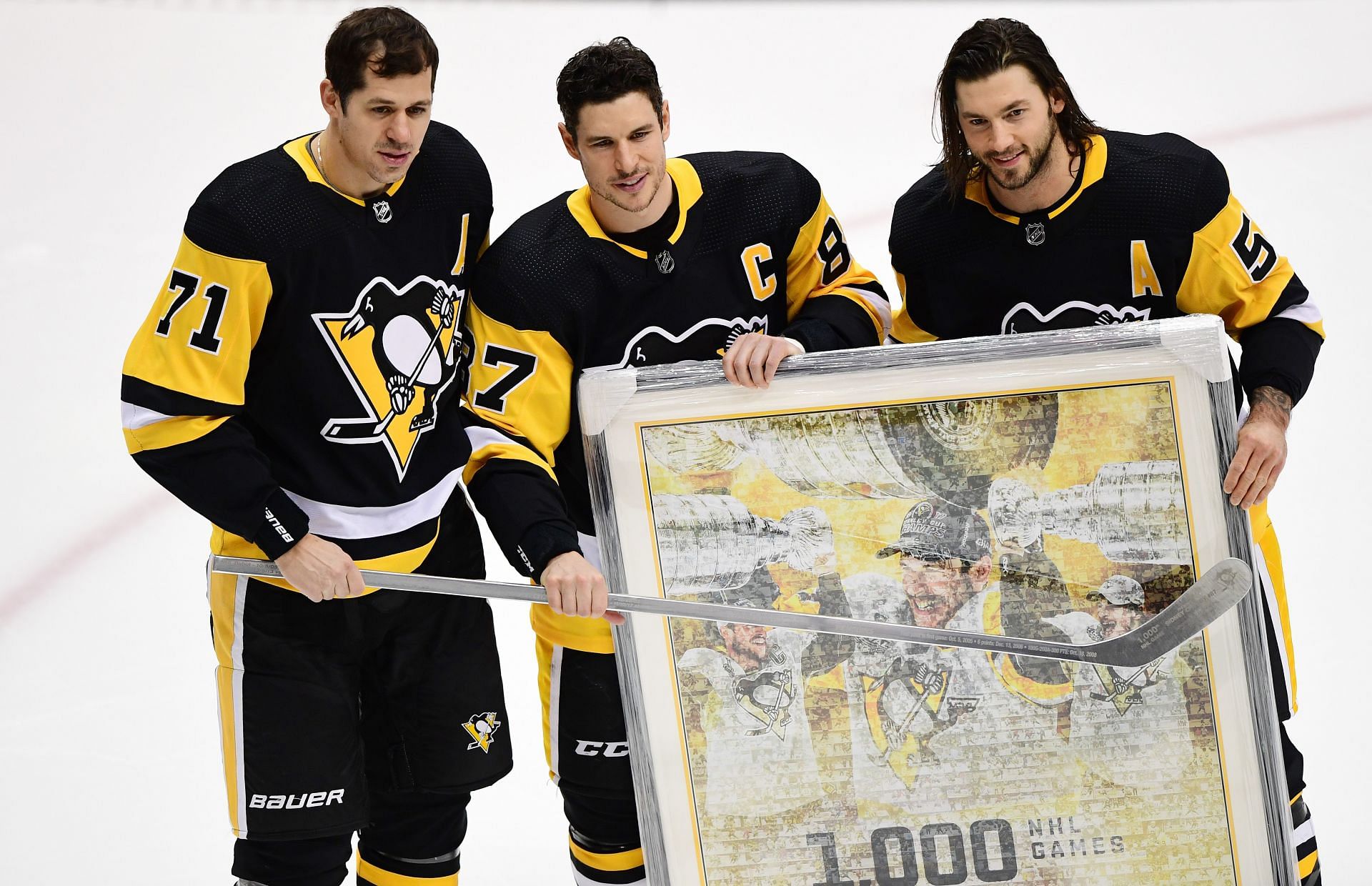 Evgeni Malkin, Sidney Crosby, and Kris Letang of the Pittsburgh Penguins