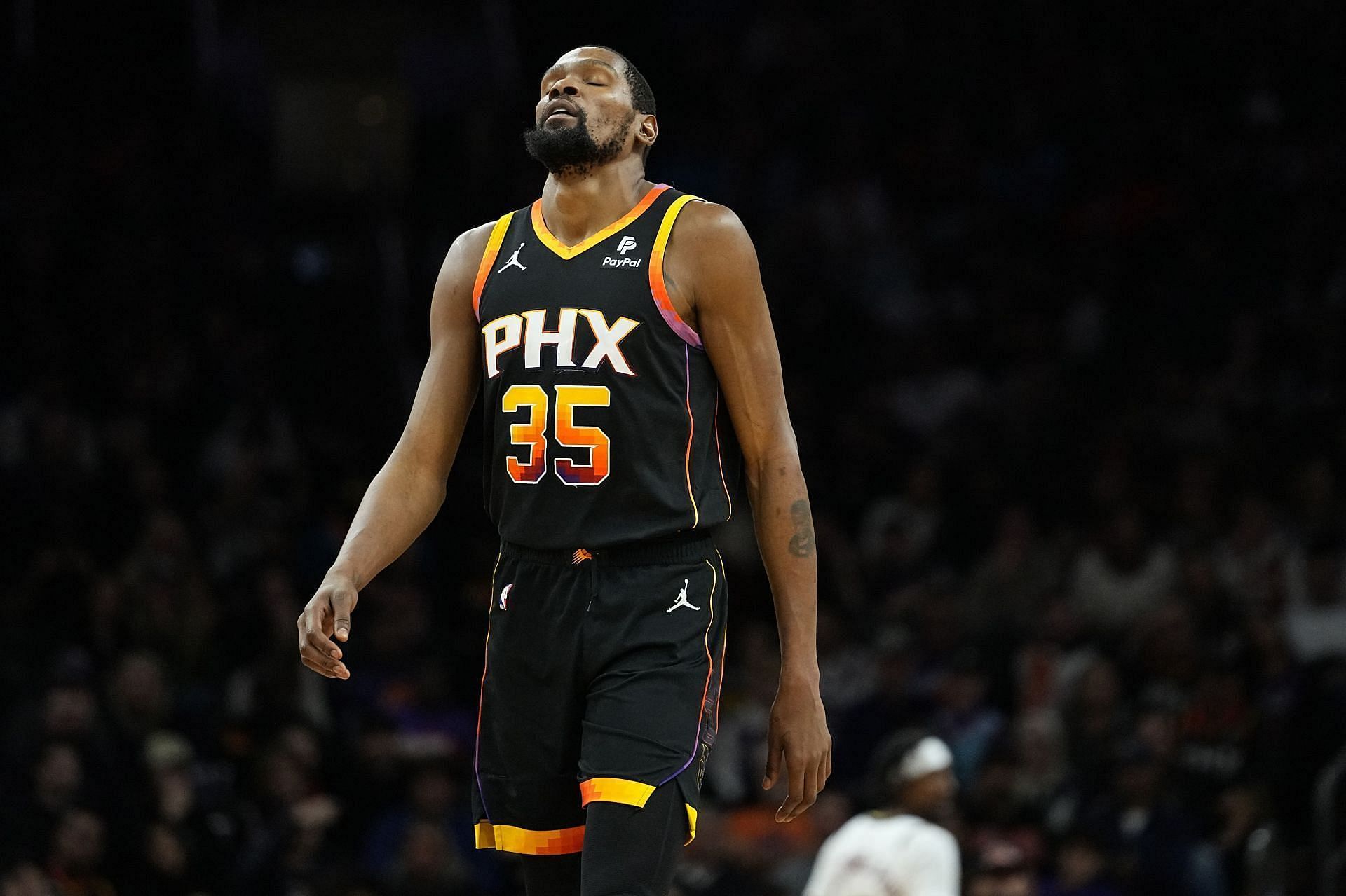 Suns&#039; Kevin Durant reacts after a failed play