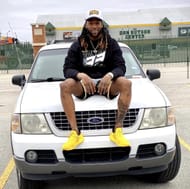 Aaron Jones with his 2003 Ford Explorer (image via Aaron Jones’ X account)