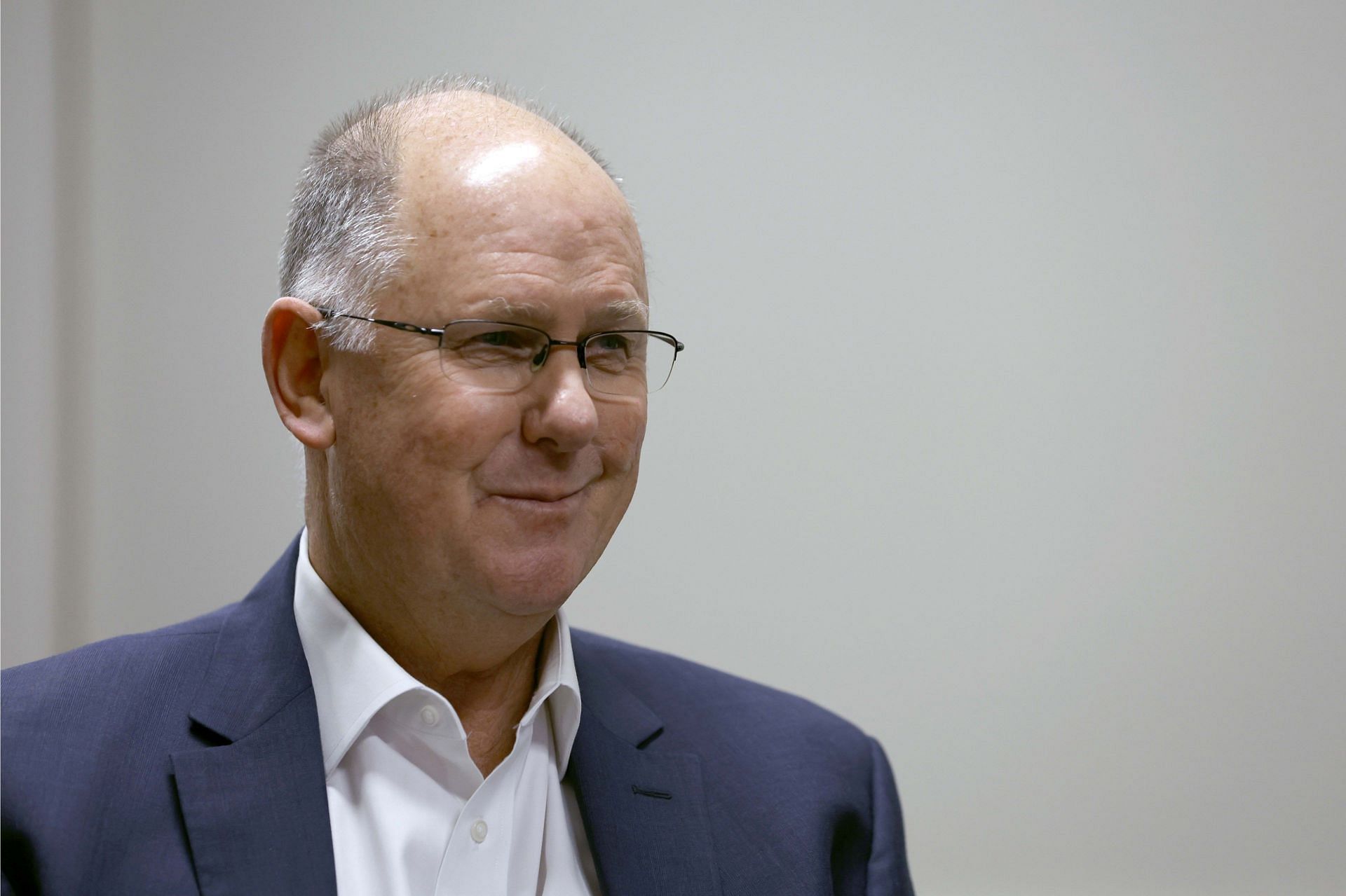 Steve Simon looks on at a press conference