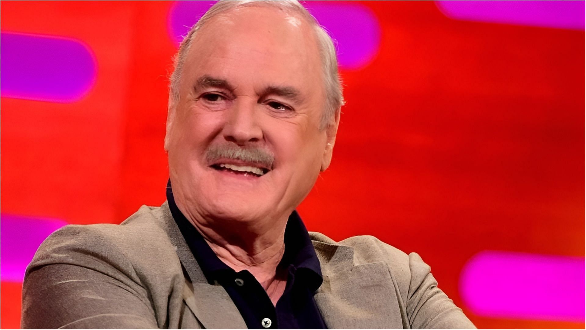 John Cleese was criticized for sharing a post where he compared Donald Trump and Adolf Hitler (Image via Rod Paul/Facebook)